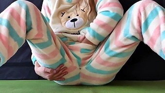 A Young Woman With Petite Breasts In Her Nightwear Pleasures Herself And Experiences A Squirting Climax